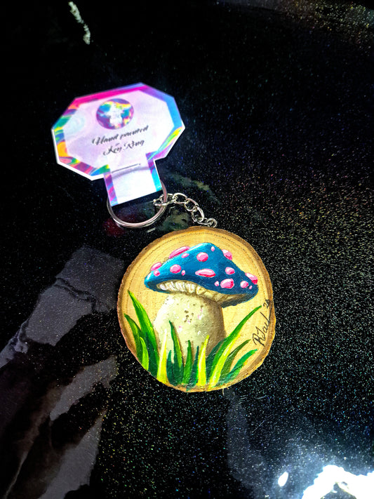 Teal toadstool keyring